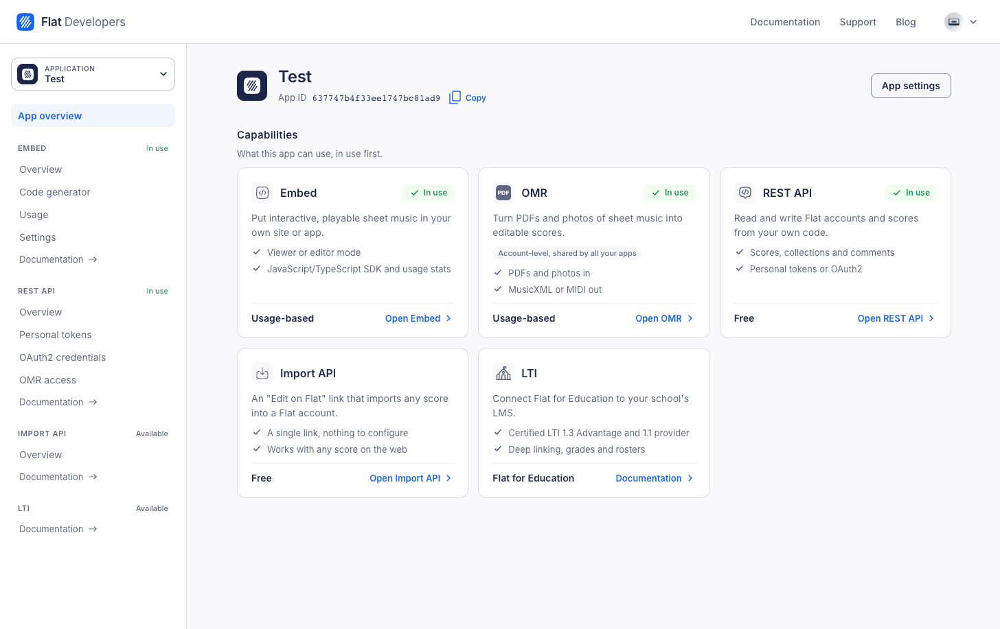 The developer dashboard app overview with a capability card for Embed, OMR, REST API, Import API and LTI